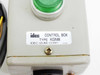 IDEC KGNW Control Box label close-up reading 'CONTROL BOX TYPE KGNW IDEC IZUMI CORP. JAPAN' with green pushbutton visible above