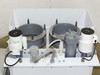 Top view of HDPE mixing station showing dual pump assemblies, PVC piping, and tank openings