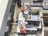 HTI Engineering HT-2 – close-up of dual squeegee head assembly with Lift to Deactivate Squeegees label and red pressure adjusters