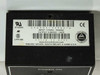 Close-up of Minarik C1XP01-115AC-A rating label showing INPUT 115VAC 50/60Hz and OUTPUT 0-90VDC 1ADC specifications