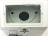 Interior chamber view through hinged transparent lid showing circular spin chuck or substrate holder and tubing