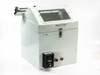 HDPE spin coating chamber front-right view showing Minarik C1XP drive controller panel, transparent hinged lid, carry handle, and power buttons