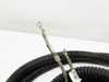 Cable harness end detail showing two bare wires with ring-terminal crimp connectors and visible wear on insulation