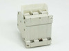 Mitsubishi CP30-BA circuit protector left side view showing DIN rail mount and terminal body