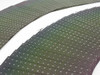 Fan arrangement of multiple Nanosolar NanoCell cells showing thin-film CIGS active surface and semi-flexible form factor