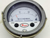 Dwyer 605-30C Magnehelic Indicating Transmitter — front face view showing full 0-30 inches of water scale, red pointer near zero, Span and Zero knobs, and Dwyer logo on lower bezel