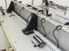 Linear rail and carriage detail — showing aluminum extrusion rail, sensors, and wiring terminal block