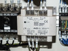 Omron S82K-05024 power supply close-up — DC24V 2.1A output, AC100-240V input, voltage selector visible