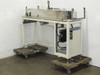 Yamaha LSII-B FLIP-X robot on stand — full rear-left view showing open controller enclosure