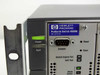 HP ProCurve Switch 4000M J4121A close-up of front panel showing Hewlett-Packard label, power and fault LEDs, DB-9 console port, reset and clear buttons