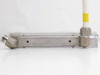 Dwyer RMB-54D-SSV flow meter — bottom of stainless steel manifold showing two mounting holes and 90-degree NPT fittings at each end