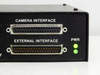 Cidtec ICM7000FX1 right-side close-up of CAMERA INTERFACE and EXTERNAL INTERFACE parallel D-sub connectors with dual green PWR LEDs