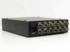 Cidtec ICM7000FX1 rear panel angled view — 12 BNC signal ports labeled ERCout, FGTRIG, BLANKout, HDRout, SYNCout, VDRout, SPout, STROBE, PIPin, HDRin, SYNCin, VDRin, plus IEC AC inlet