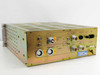 Riber ACE 1010 rear panel angled view – gold zinc-plated chassis, multiple circular multi-pin HV connectors with yellow high-voltage warning labels, DB-25 connector, IEC power inlet