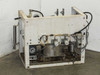 Lacquer pump dispensing system – rear view showing secondary tanks, wiring, tubing, and frame structure