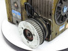 Sankyo Sandex 11DU indexing drive – left side view showing timing belt pulley and toothed input pulley detail in foreground