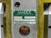 Sandex 11FU nameplate closeup showing model 11FU-31469R-L1A1/X, serial number, and Sankyo Seisakusho Tokyo Japan label