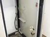 Interior right side panel of 38U rack cabinet showing wiring leads, metal shelf bracket, and cable grommet