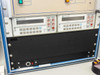 Lower section of Nano Instruments control cabinet — two HP 3478A multimeters rack-mounted side by side with input terminals and load specification label below