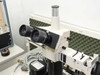 Olympus BH2-UMA Universal Vertical Illuminator microscope — binocular eyepiece and tube assembly close-up showing eyepiece optics