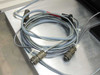 System interconnect cables — coiled braided-shield cables with military-style circular connectors for nanoindenter system
