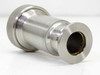 Vacuum pump bellows connector fitting – opposite angled side view showing smaller flanged end and interior bore with visible O-ring/seal