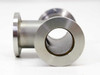 Stainless steel KF25 NW25 vacuum tee fitting — angled view showing two of the three flanged ports and bore interior with brass-toned O-ring seat visible