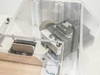 Uni-Solar MX1-711-000-5 — close-up of left-side cutting head assembly showing slanted blade, spring-loaded holder, and scrap chute