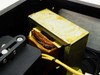 Dowty TC-48 interior close-up — power transformer showing yellowed varnish and laminated core, wiring connections
