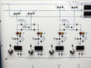 Close-up of lower portion of gas flow mimic panel showing four-channel MFC/valve control section with run/purge/isolate selectors and digital displays