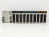 NAIS FP2-BP14 backplane front view showing full module lineup from PSA3 power unit through Y64T output modules