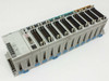 NAIS FP2-BP14 14-slot PLC backplane with all modules installed — front left angled view showing PSA3, FP2-C2, PP42, X64D2, and Y64T modules