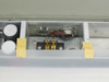 Interior closeup of LCD Co MF-7A showing terminal block, strain relief fitting, and wiring connections in right electronics compartment