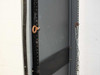 Interior side view of rackmount cabinet showing chain latch mechanism and key ring on the left rail