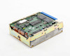 Quantum ProDrive 40S hard drive angled view showing full PCB board with controller ICs and blue SCSI ribbon connector