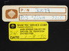 Close-up of panel labels showing Part Number 30079, P/S +20 Volt 7200, and BancTec Service Corp service tag dated 1-8-90