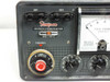 Simpson 498-A TV Field Strength Meter — close-up of front panel showing Simpson logo, 'TV Field Strength Meter Model 498-A' label, UHF and VHF input terminals, channel selector, and signal level/channel calibration rotary knobs