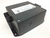 Control Concepts Islatrol IC+107 Active Tracking Filter — three-quarter front-left view showing black enclosure with flanged mounting base and label