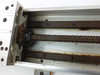 Yamaha LS1BL-850 end detail showing ball screw nut, bearing block, and screw threads with rust and surface corrosion
