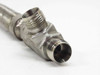 Close-up of 90-degree elbow end — duplicate angle showing dual NPT ports and thread condition