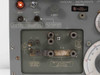 Front panel detail showing INPUT I and INPUT II terminal block with frequency range labels (40 kHz–50 MHz and 20–300 MHz), Q ZERO control, and SRA distributor badge