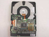 IBM DHEA-38451 hard drive PCB underside view showing controller board with main controller IC and read/write channel chip