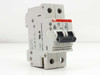 ABB S272-K4A 2-pole 4A circuit breaker — left-side view showing DIN rail clip, UL marking, and VDE 0660 label