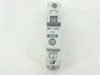 Allen-Bradley 1492-CB1 H010 1A circuit breaker — side profile view showing toggle switch and terminal screws