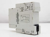 Crouzet TK2R1 Chronos 2 timer relay — rear label showing voltage ratings 24VDC, 24-240VAC, timing range 0.06s-160s, and wiring diagram; Made in France marking visible