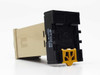 Omron E5C2-R20P temperature controller rear view with P2CF-08 socket base and yellow terminal clip, Made in China label visible