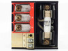 Eurotherm 831 rear terminal block closeup — red screw terminals 1–3 with oxidation visible, gold screw terminals 4–6, and Ferraz A025 F025 250V-25A fuse