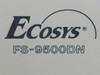 Kyocera Ecosys FS-9500DN model name and logo closeup on printer body