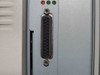 Kyocera Mita FS-9500DN rear interface panel — DB-25 style connector with orange and green indicator LEDs