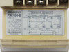 SMC PSE100-B wiring diagram label on base showing 10-terminal layout, 1-5V and 4-20mA inputs, NPN 30V 80mA output ratings, and pressure ranges